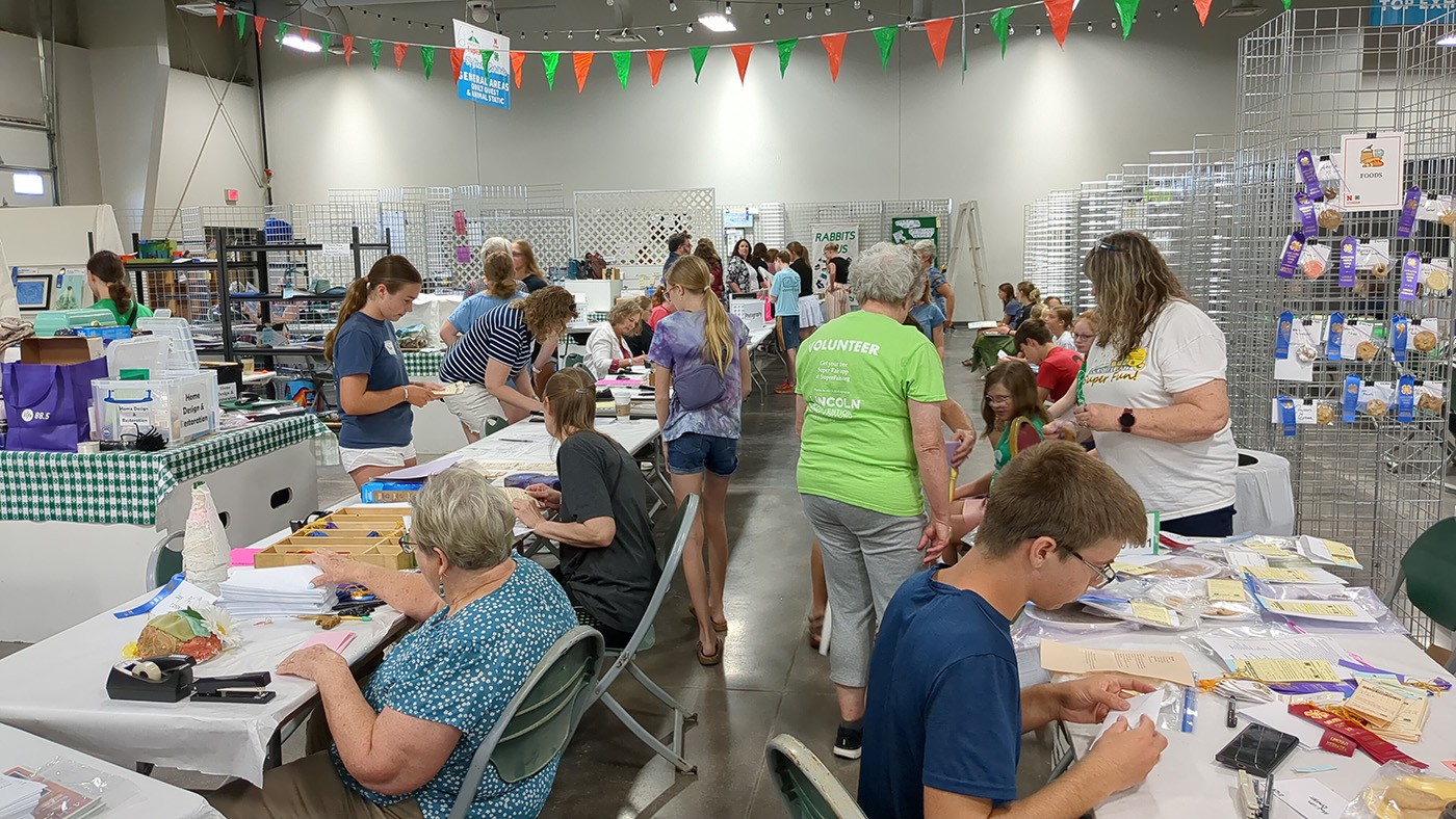 Volunteers and superintendents during 4-H static exhibit judging day at the 2025 Lancaster County Super Fair