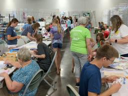 Volunteers and superintendents during 4-H static exhibit judging day at the 2026 Lancaster County Super Fair