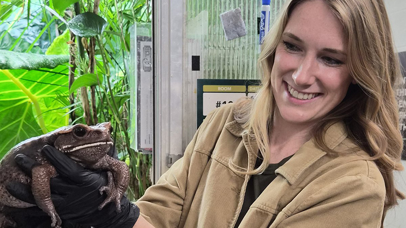'Conservation Works' host Carlee Moates meets a Blomberg's toad during her visit to the Omaha Henry Doorly Zoo's Amphibian Conservation Area.