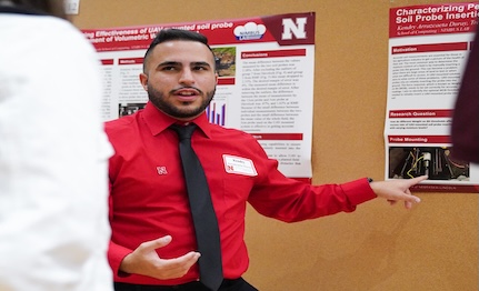 Summer Research Program (SRP) scholar Kendry Arrazcaeta Duray, University of Nebraska-Lincoln student, presents his research at the 2024 Nebraska Summer Research Symposium. Photo by Tommy Thorpe.