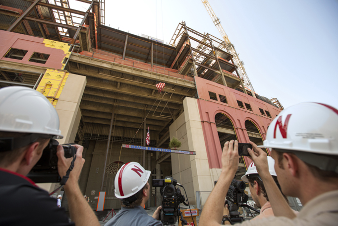 As part of a steel-workers' tradition, the final beam was erected Aug. 30 in a "Topping Off" ceremony, attended by media.