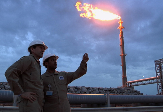 Fueling a tanker in Qatar, the world's largest producer of liquified natural gas.