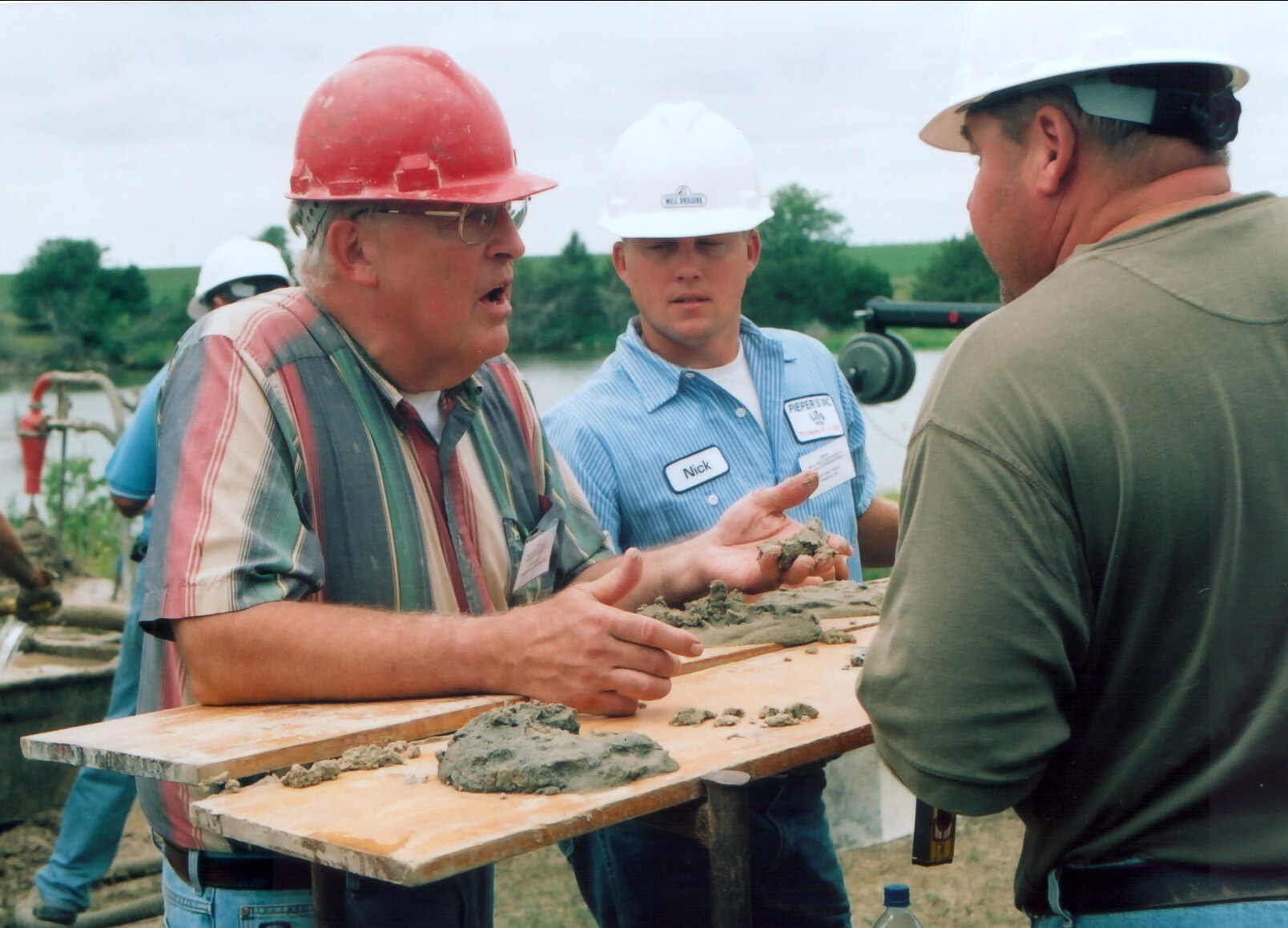 James W. Goeke holds sediment material at drill site near the Ogallala Aquifer.