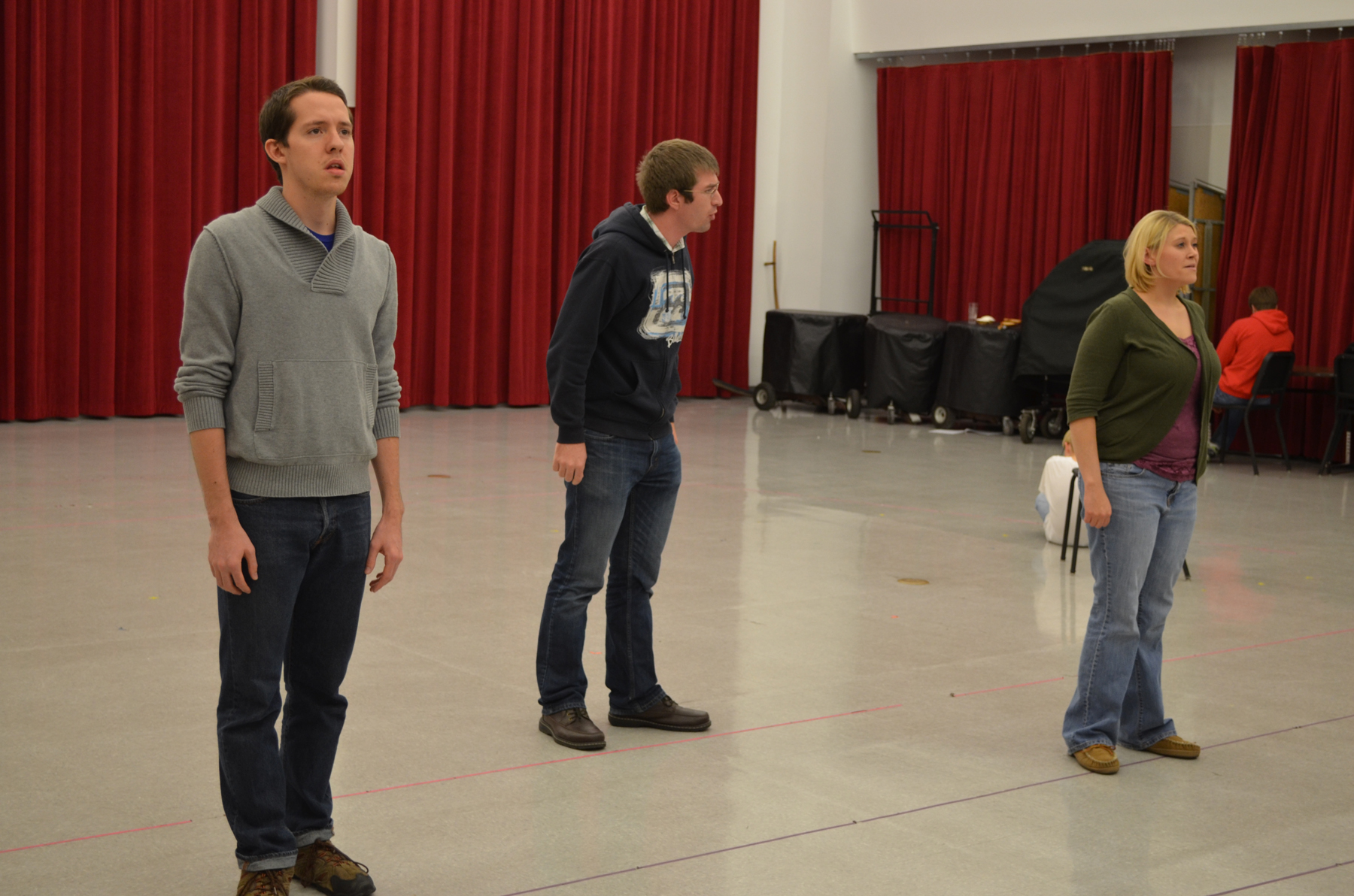 (From left) Timothy Patrick Madden, Matthew Clegg and Talea Bloch rehearse an "O Pioneers!" opera scene.