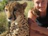 Katherine Lawry, now a graduate student at UNL's School of Natural Resources, is seen here with a cheetah during a study-abroad trip to Namibia, Africa in 2011. (Photo courtesy)