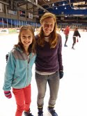 NHRI counselor Brooke Talbott (right) and junior counselor Katherine spending an evening at the ice rink.