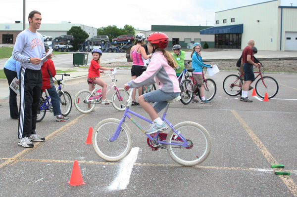  In the bicycle skills events, 4-H’ers maneuver through several designated courses to test their riding skills and safety. A bicycle inspection reinforces the importance of bicycle maintenance and safety features.