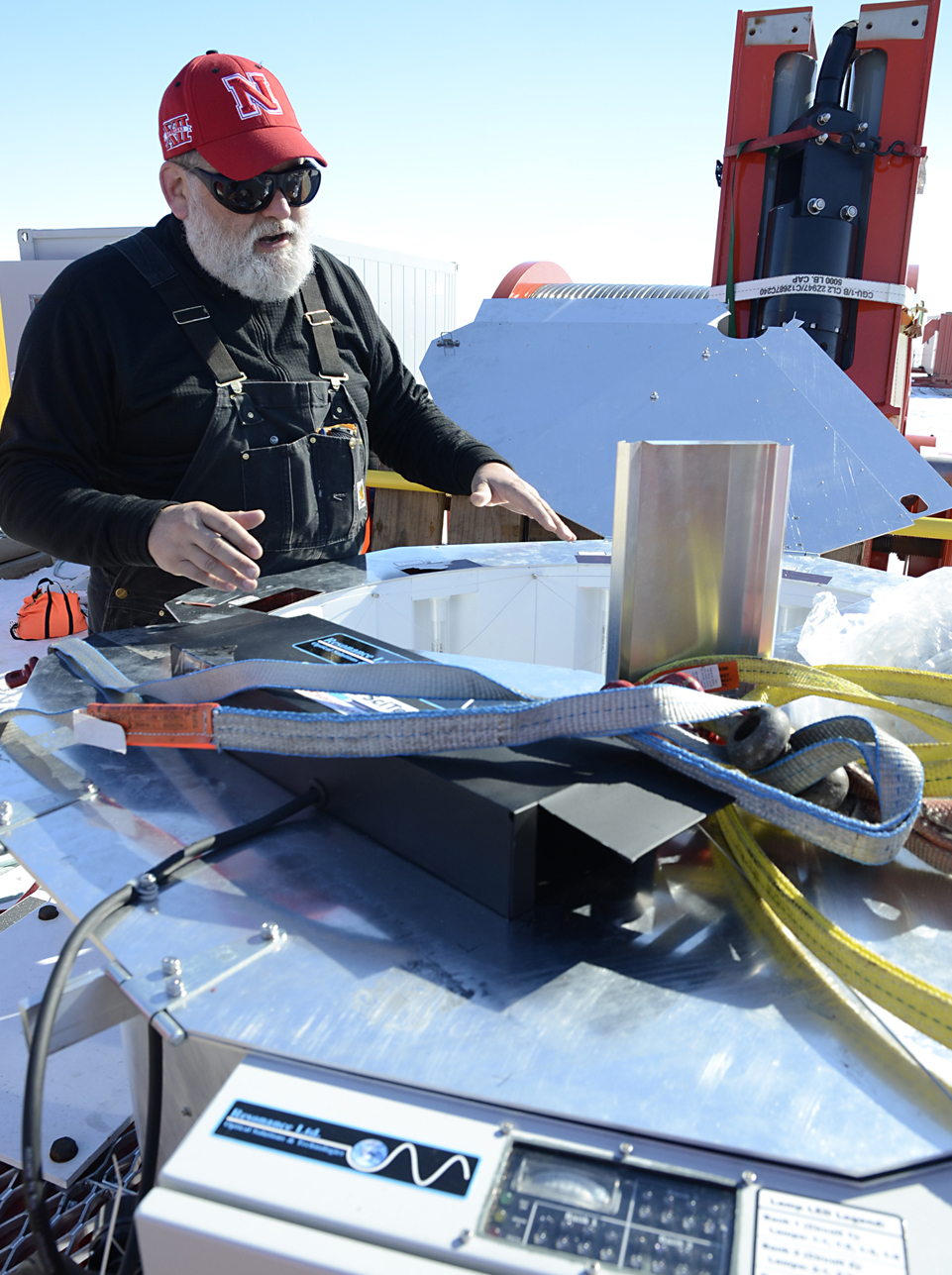 UNL's Frank Rack explains the operation of the drill's UV collar used to decontaminate hoses and cables deployed downhole. Rack is executive director of the ANDRILL Science Management Office and associate professor of Earth and Atmospheric Sciences.