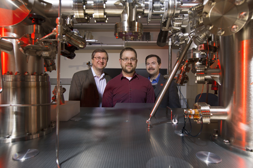 UNL physicists (from left) Evgeny Tsymbal, John D. Burton and Alexei Gruverman in the UNL Materials Research Science and Education Center’s Thin Film Growth and Characterization Facility. (Photo by Craig Chandler/University Communications)