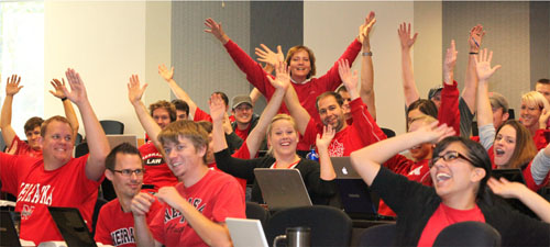Students avoid getting called on in Professor Colleen Medill's property class by wearing Husker red.