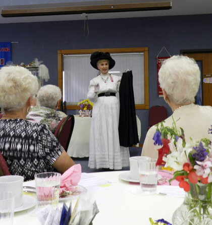 Susan McLain leads a "Yesterday's Lady" presentation.