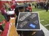 Mallory Miller of Council Bluffs, IA, has a special note for her parents across her mortar board as she waits to pick up her diploma form the College of Journalism and Mass Communication. Photo by Craig Chandler / University Communications