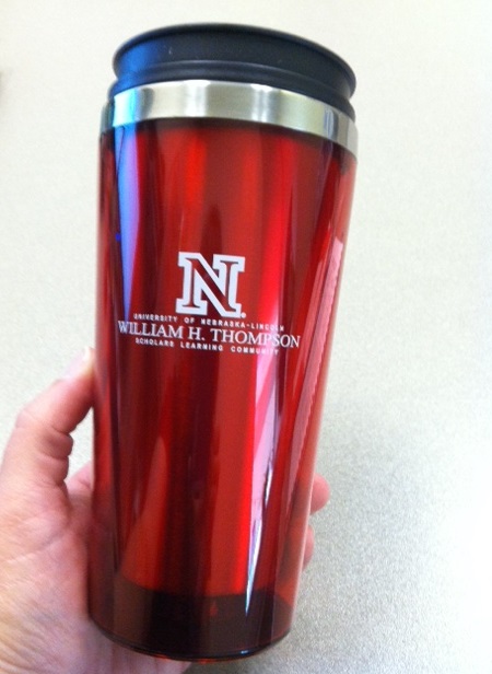 Scholars earn a W.H. Thompson travel coffee mug after studying 40 hours at the Study Cafe.