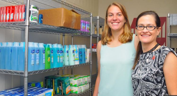 Leadership from Megan Rudolph (left) and Kelli Smith led to the creation of OpeN Shelf, a pantry that offers hygiene items and non-perishable food to students in need. (photo by Troy Fedderson | University Communications)