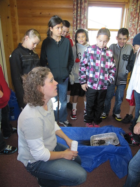 Katie Pekarek explains the value of stormwater as a resource to a group of students. (Courtesy photo)