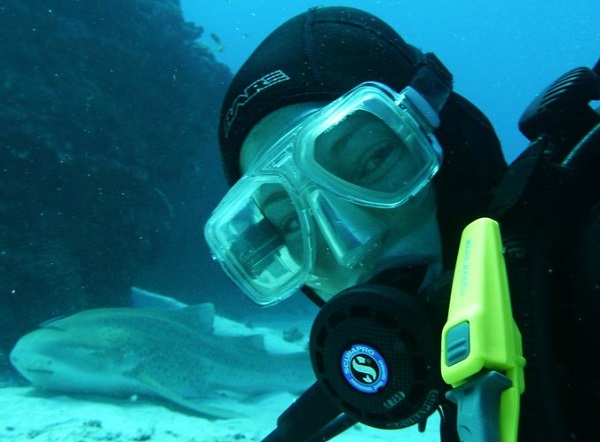 Kay Kunze scuba diving near a Zebra shark. (Courtesy photo)