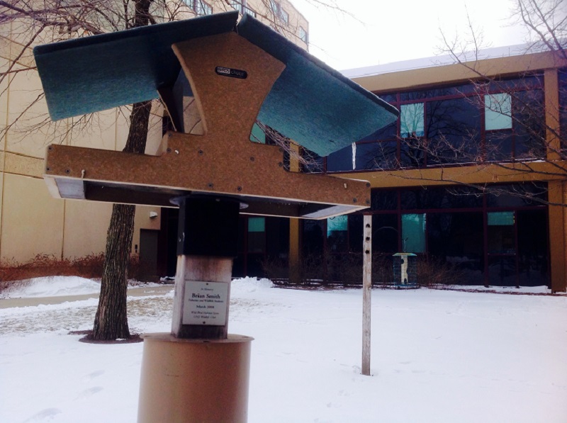The two bird feeders donated by the Titteringtons in memory of Brian Smith. The feeders are located to the north of Hardin Hall on UNL's East Campus.