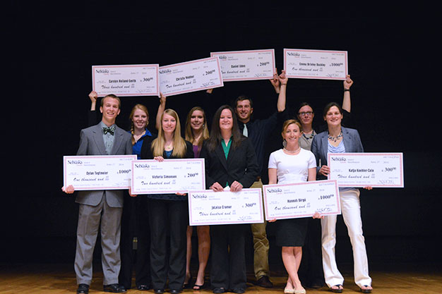 The SNR Elevator Speech Contest finalists gather together on the Hardin Hall auditorium stage. (Mekita Rivas | Natural Resources)