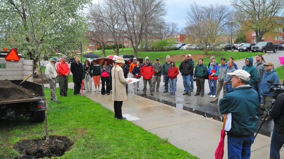UNL's Eileen Bergt talks during an April 23 Arbor Day tree planting on East Campus. The event and a student-led tree planting on April 25 fulfill requirements for the Arbor Day Foundation's Tree Campus USA program. (Troy Fedderson | University Communicati