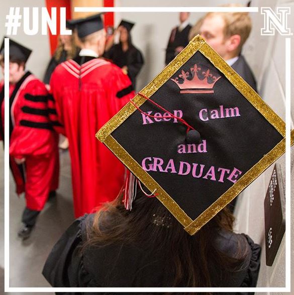 Jing Wen's mortar board contains great advice as everyone hurries to their places before Saturday's commencement. University of Nebraska-Lincoln undergraduate commencement. May 10, 2014.  (Photo by Craig Chandler / University Communications — at Pinnacle 