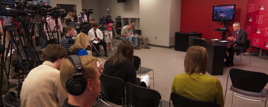 Tom Osborne, athletic director, discusses the proposed expansion projects with members of the media on Oct. 8.