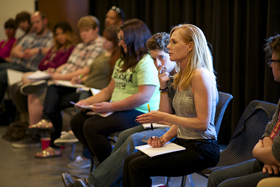 Marg Helgenberger works with students in Lecturer Laura Lippman's Intermediate Acting class in the Johnny Carson School of Theatre and Film. Photo by Michael Reinmiller.