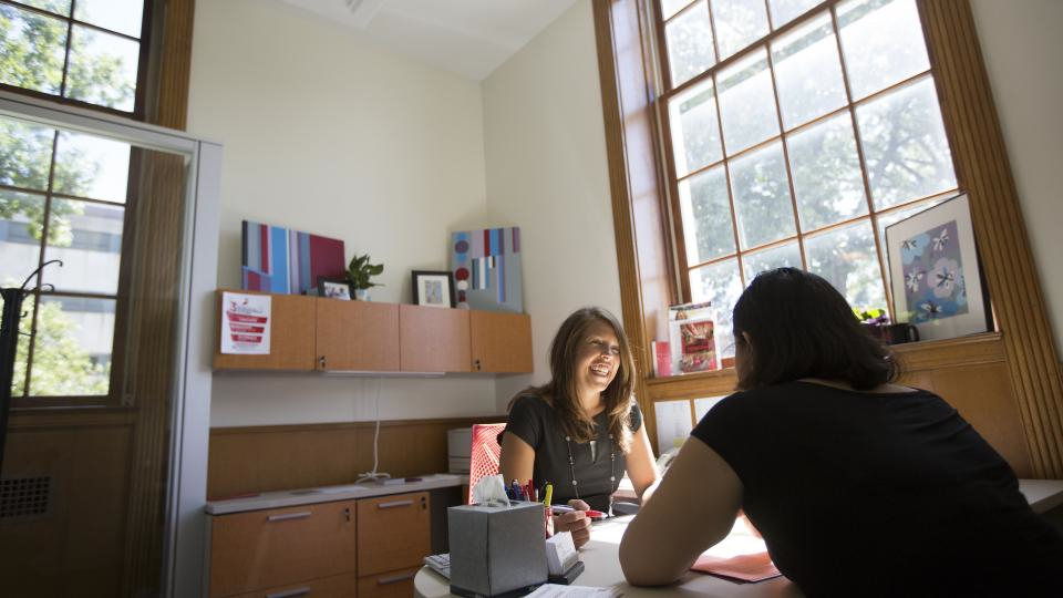 Meeting with an advisor can be a fun experience. Image courtesy of UNL Announce.