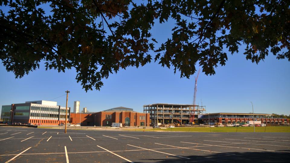 Construction at Nebraska Innovation Campus continues with work on the Food Innovation Center (right). Completed buildings include Innovation Commons (left), which includes the former Nebraska State Fair 4-H Building. 