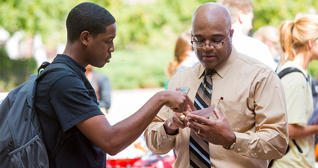 An advisor aids a student in career exploration.