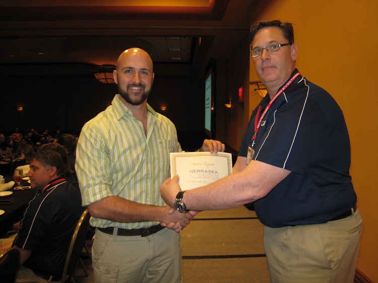 Andrei Snyman, doctoral student, receives the 2015 Nebraska GIS/LIS Association Student Award. 