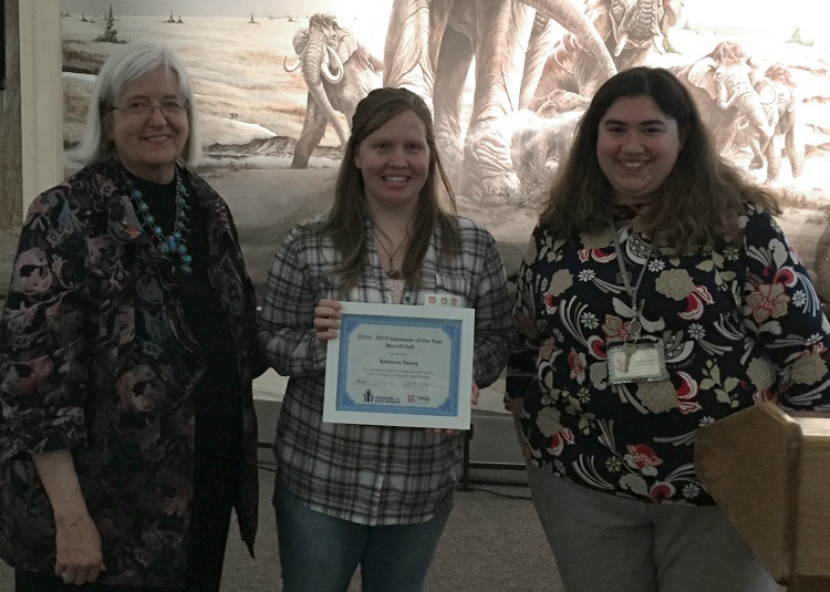 Becky Young (center) awarded with the the University of Nebraska State Museum's Volunteer of the Year certificate at the museum's annual volunteer recognition event. (Courtesy photo)