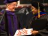 Barbara Hendricks receives her honorary doctor of fine arts degree from UNL Chancellor Harvey Perlman at Commencement on May 9. Photo by Greg Nathan.