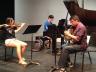 The Onyx Trio rehearses, featuring Sarah Ng, violin; Yongwhi Lee, piano; and Miguel Villarreal, horn.
