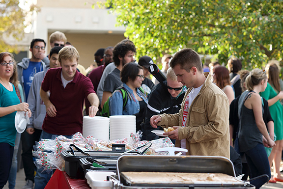 Students from the Hixson-Lied College of Fine and Performing Arts and College of Architecture came together for food, fun and music at the Friday Fusion Tailgate in the Arts Quadrangle on Oct. 24. Photo by Michael Reinmiller.