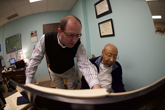 Pianist Denis Plutalov asks a question of composer Robert Owens during Owens’ visit to UNL in March. Photo by Michael Reinmiller.