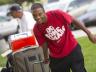 Jerrod Easter, of Omaha, pulls some of his belongings into Harper Hall during move-in at UNL last year (photo by: Craig Chandler | University Communications)