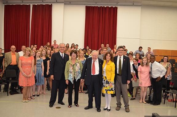 (left to right) Glenn Korff School of Music Director John Richmond, Rhonda and James Seacrest, University of Nebraska Foundation's Lucy Buntain Comine and Hixson-Lied Endowed Dean Charles O'Connor with vocal music students and faculty on Aug. 24.