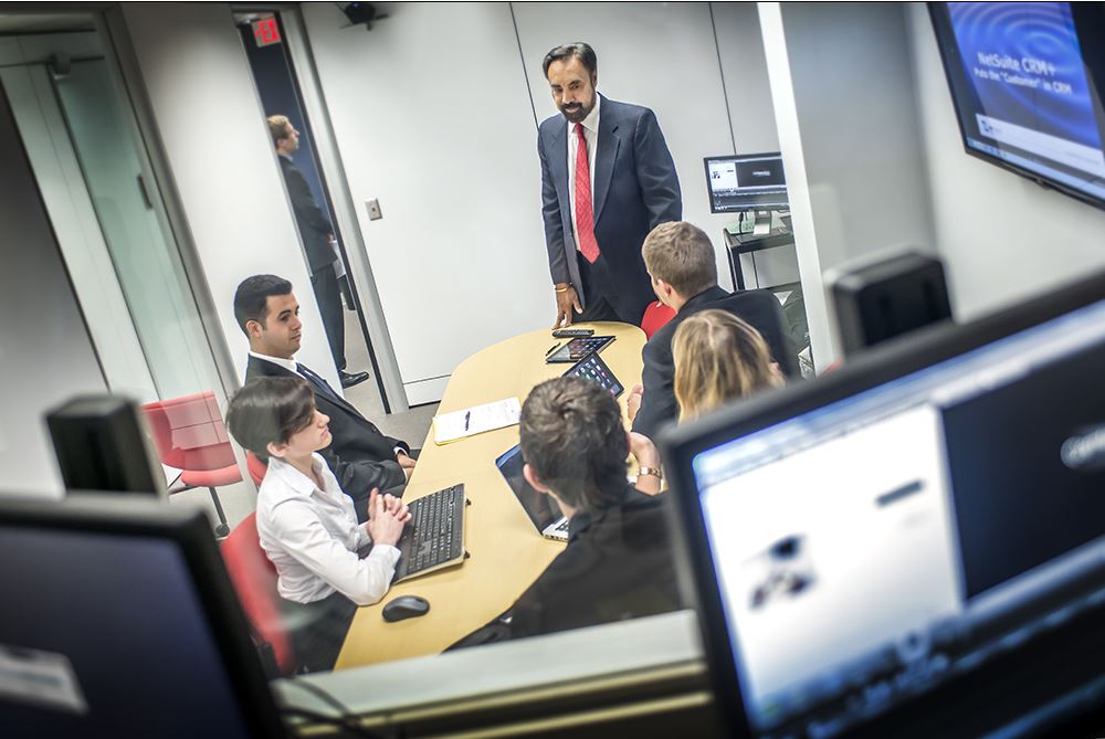 Dr. Ravi Sohi, director of the Center for Sales Excellence and RHays Distinguished Chair in Marketing, meets with students enrolled in the sales program at the UNL College of Business Administration.