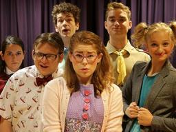 The cast of "The 25th Annual Putnam County Spelling Bee" received a certificate of merit for achievement in Ensemble Work and were an invited scene at the Region V Kennedy Center American College Theatre Festival.