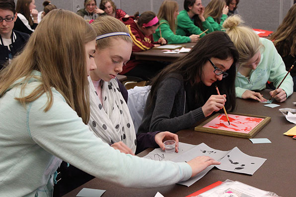  High school students take part in a Harry Potter-inspired chemistry session during the 2015 Women in Science Conference.