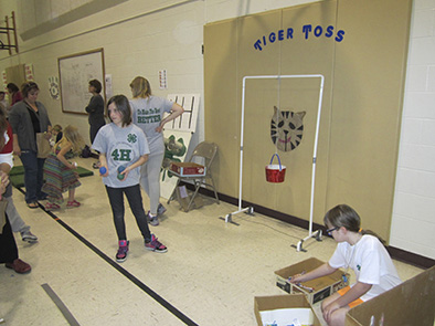 4-H clubs are needed to create and staff carnival-type booths, such as bowling pins, throwing bags through holes, etc. at Kiwanis Karnival.