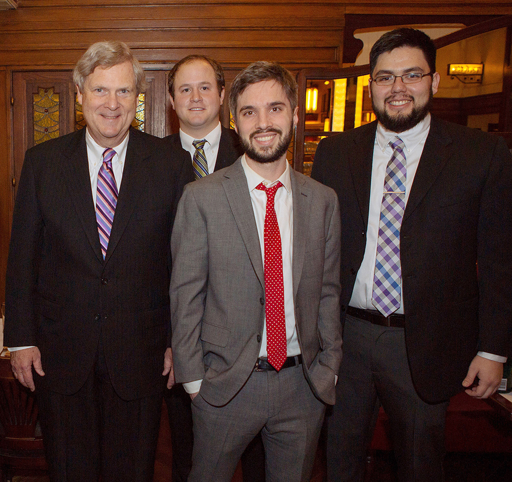 UNL students Matt Pedersen (second from left) and Fernando Napier (far right) are recent winners in the USDA-Microsoft Innovation Challenge. Also pictured are Secretary of Agriculture Tom Vilsack (left) and Ben Wellington. (Ben Ericson, Microsoft)
