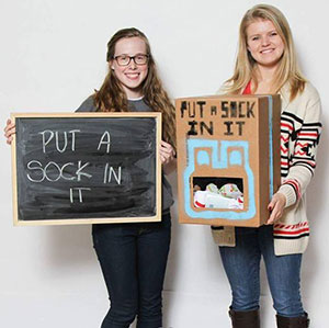 Put a Sock In It collection boxes in Othmer and Nebraska halls.