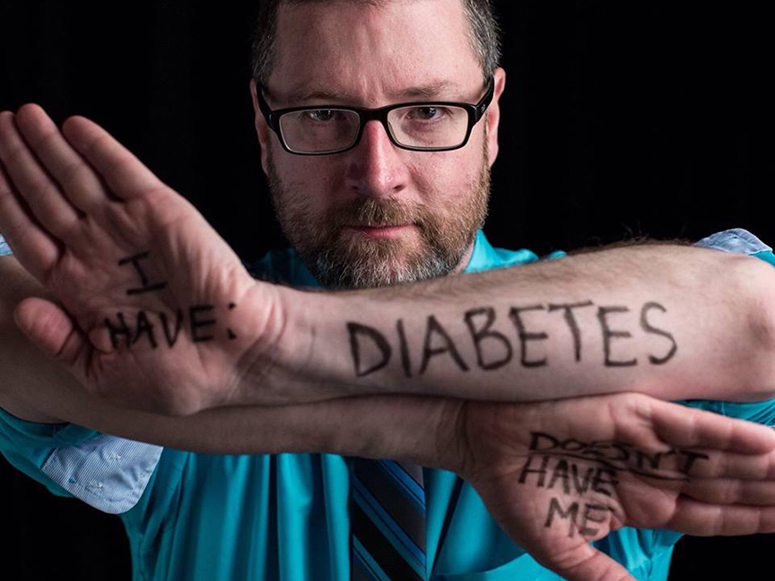 Mike Jackson, assistant director for marketing and communications with Student Involvement, poses for the Dear World project during a conference in New Orleans. The project, which allows people to tell their story through a few words and a photo, will mak