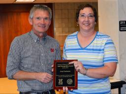 SNR director John Carroll presents Caryl Cashmere with the spring 2016 SNR Staff Recognition Award on April 15. (Shawna Richter-Ryerson | Natural Resources) 