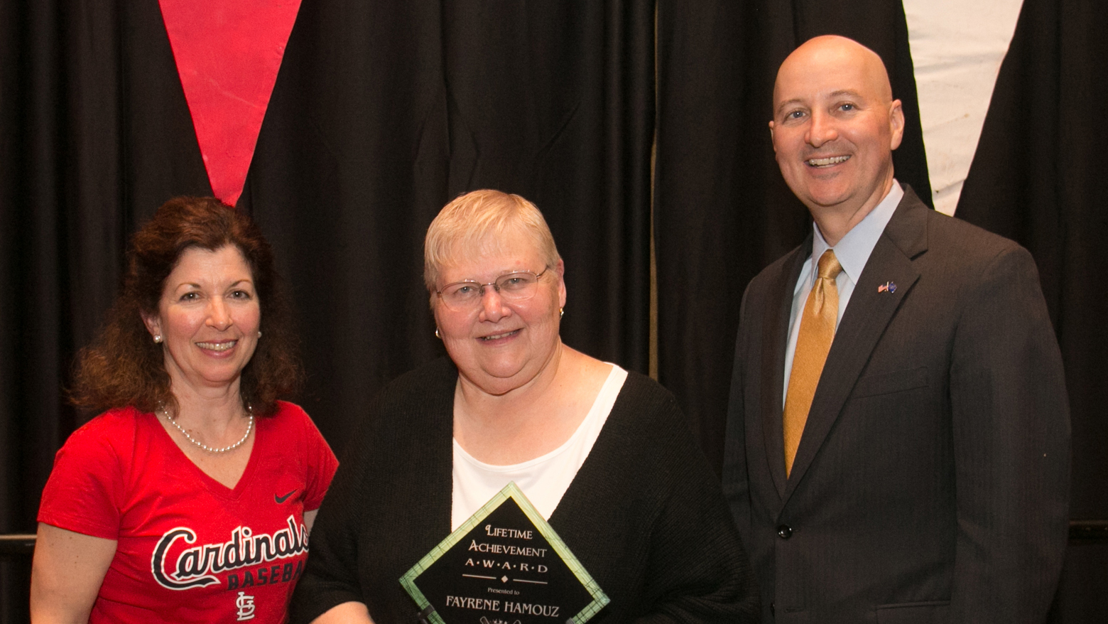 Fayrene Hamouz, associate professor in Nutrition and Health Sciences, received a lifetime achievement award from the Nebraska Restaurant Association April 18. She is pictured with association President Nicole Jesse and Gov. Pete Ricketts.