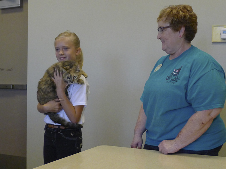 A 4-H'er prepares to show her cat the judge at the 2015 Lancaster County Super Fair.