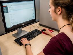 A student works in the University of Nebraska–Lincoln's new Digital Learning Center. The new facility, located in Love Library North, opened in June. (David Houfek | Information Technology Services)