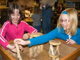 Young visitors explore science through hands-on activities in the Dr. Paul and Betty Marx Science Discovery Center in Morrill Hall. The museum will offer free admission from 4:30 to 8 p.m. each Thursday in July. (University of Nebraska State Museum) 