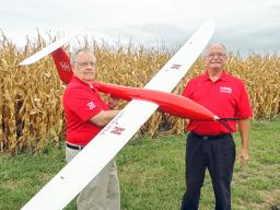 George Meyer, left, and Wayne Woldt complete a preflight check on the Tempest unmanned aircraft. | Courtesy photo